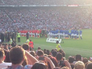 Teams line up before kick off